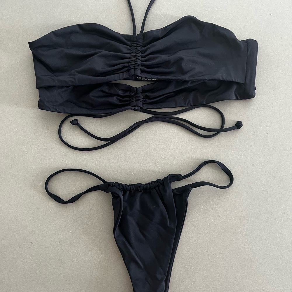 Frankie’s bikini black top + both size small, only worn once. Super flattering!